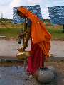 Woman in India collects potable water from PV-powered pump. Photo: Ullal, Harin, Central Electronics, Ltd. Courtesy NREL